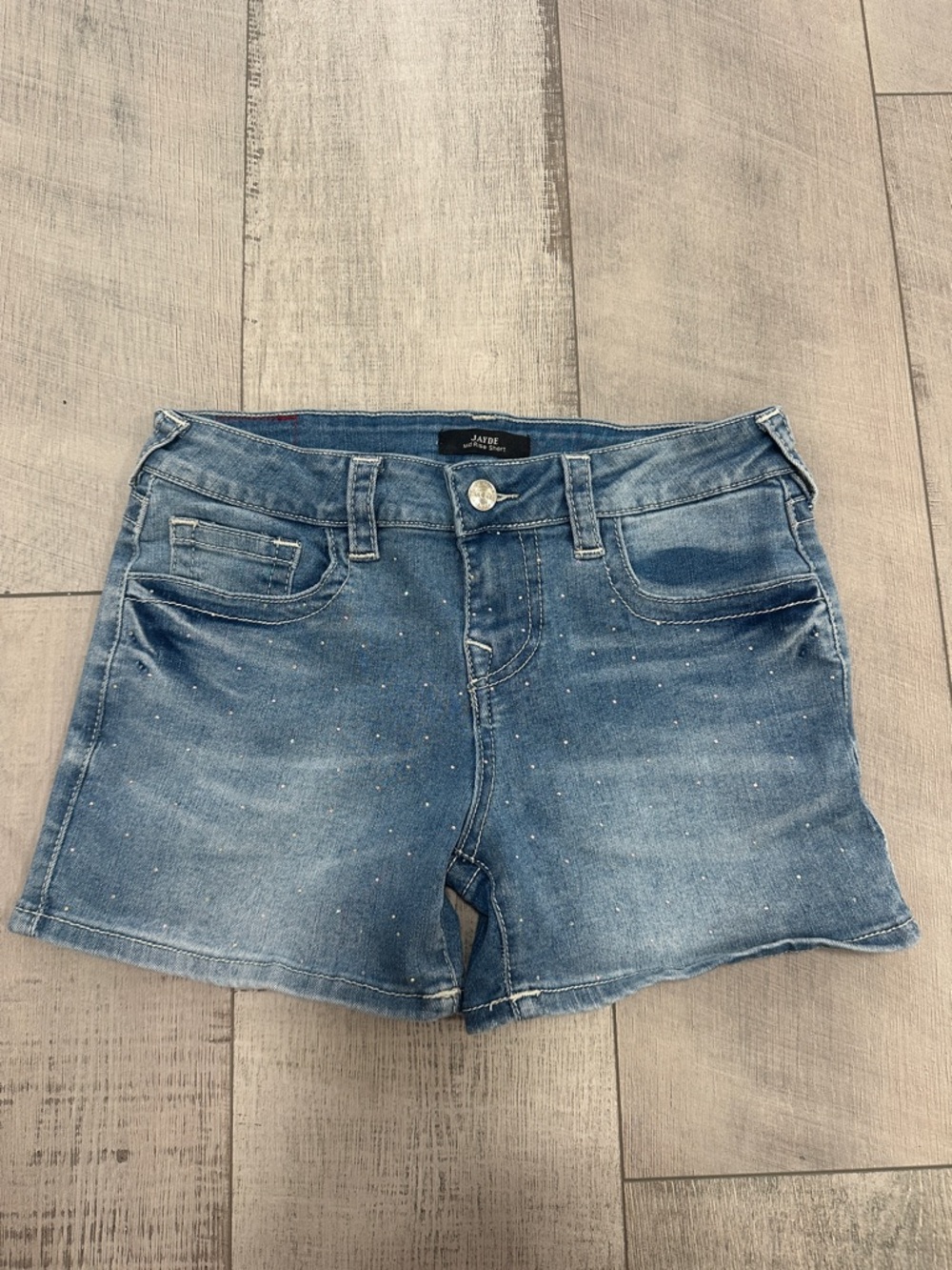 True Religion Faded Blue Denim Shorts with Subtle Sparkle